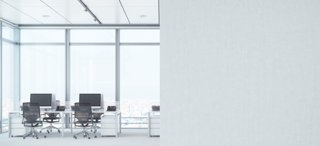 A white, sun filled, empty boardroom 